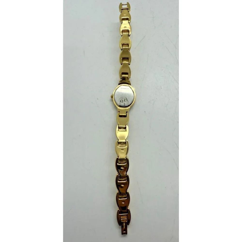 Vtg Caravelle by Bulova Quartz Womens Oval Watch Two Tone Black Face Rhinestones